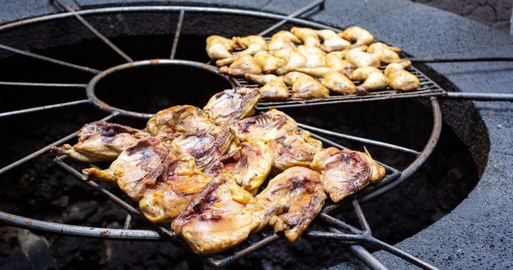 cooking chicken on an outdoor grill