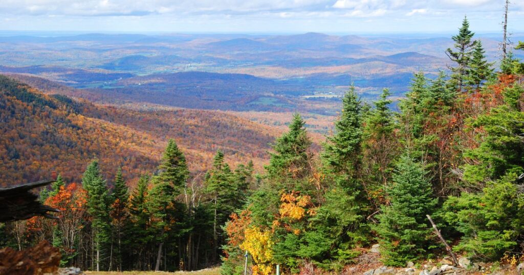 a hike in smugglers notch state park in vermont during the fall