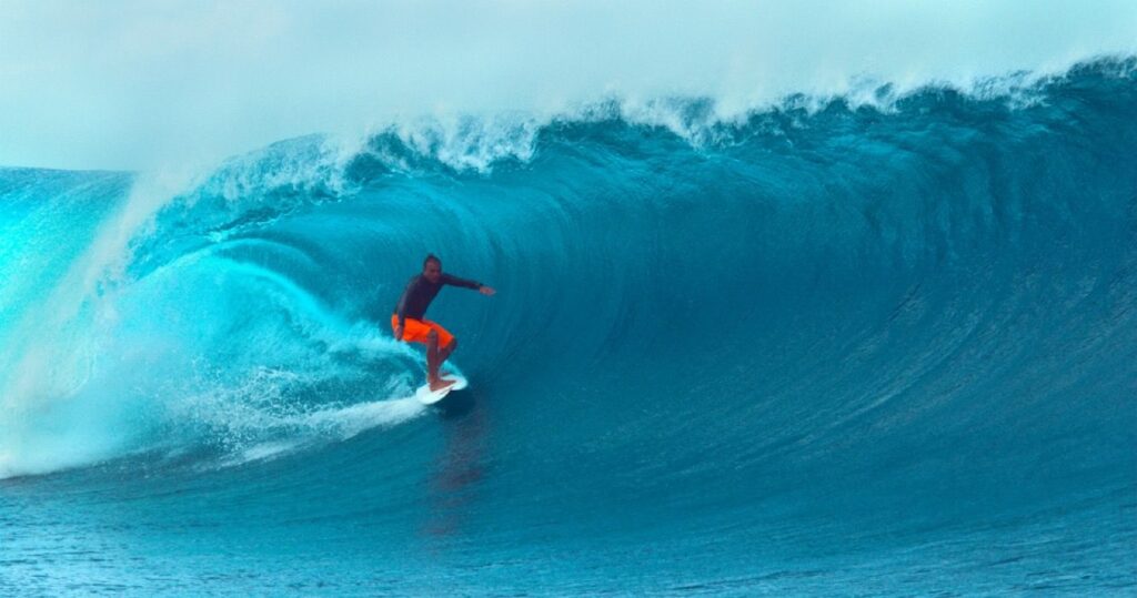 Surfing on waves in Tahiti